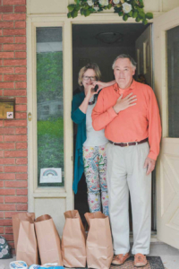 couple donated food in doorway